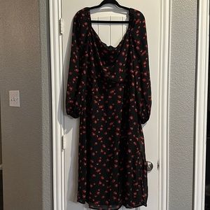 Black summer dress. Roses detailing. Sheer material.